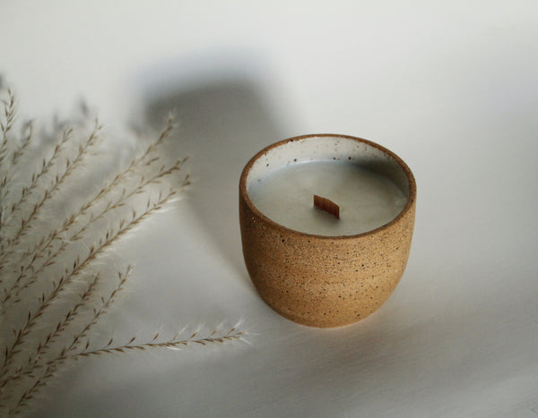 Ceramic candle with raw exterior